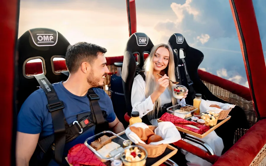 Breakfast served in a hot air balloon basket over the desert